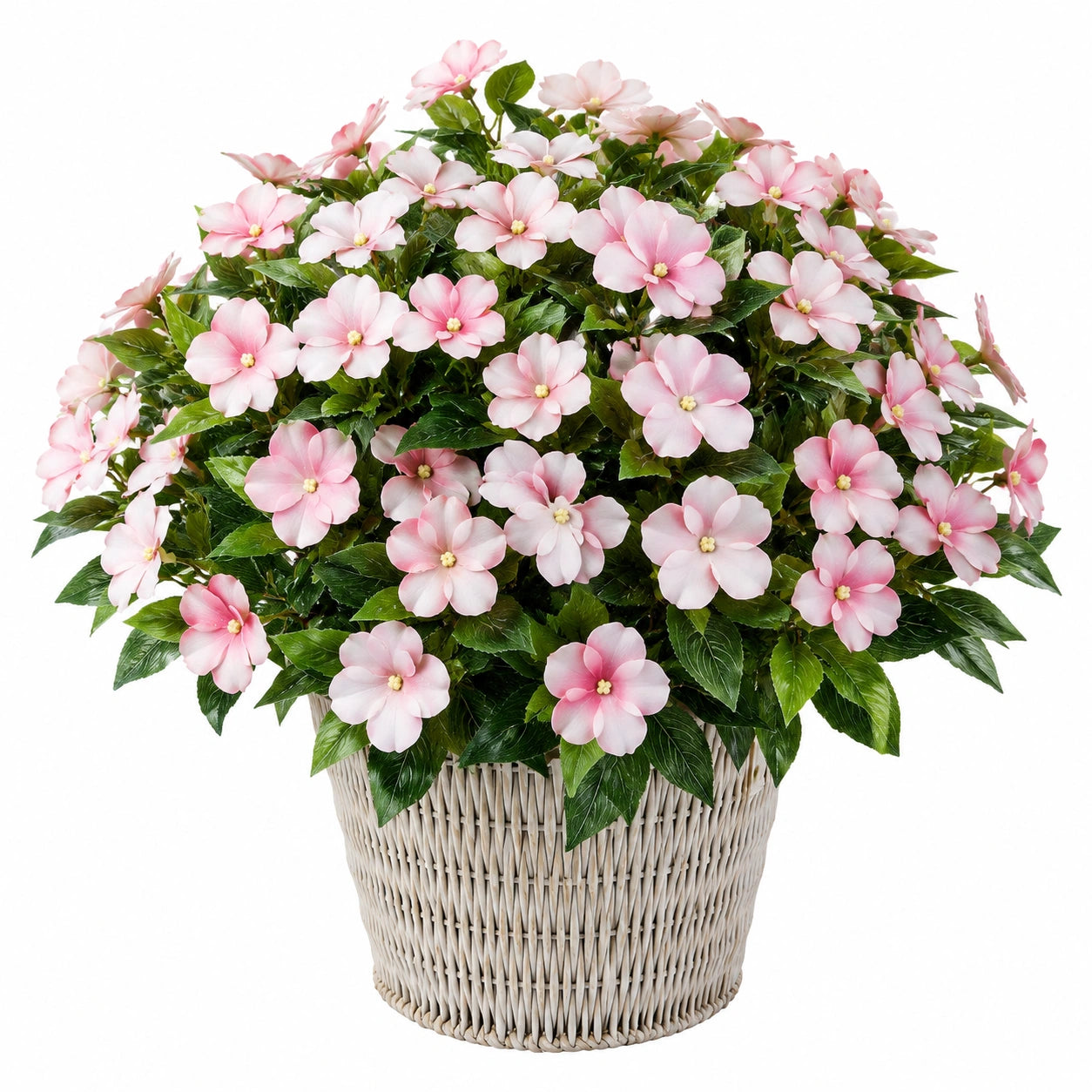 Plante artificielle avec fleurs roses en pot d'osier